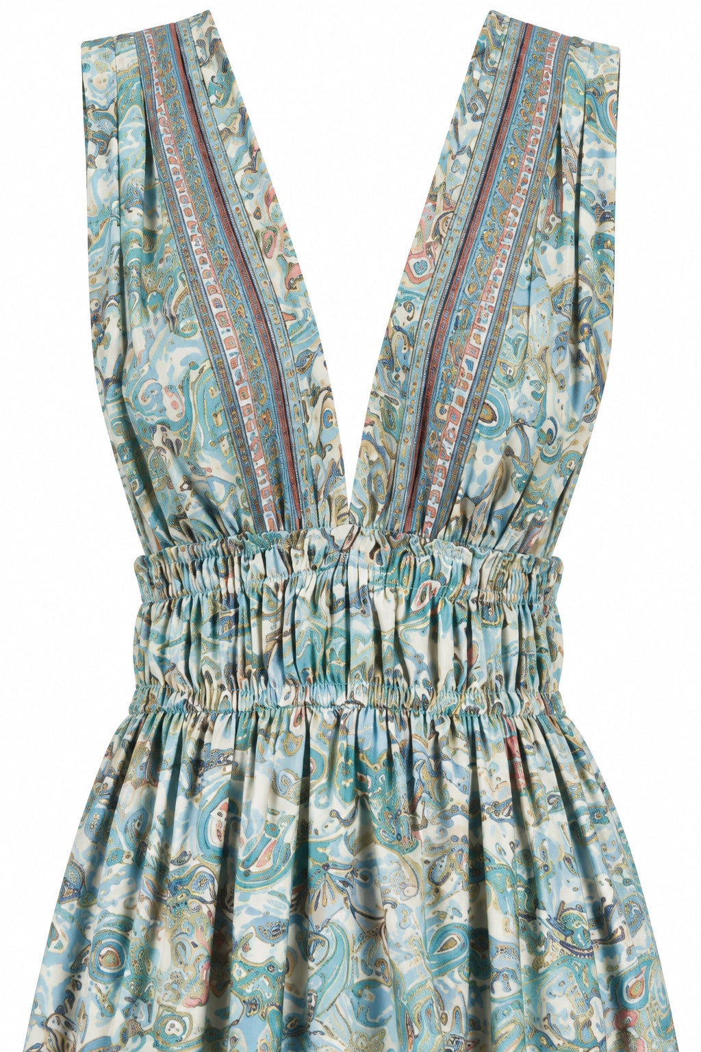 A close-up of a sleeveless dress with a deep V-neckline, featuring a gathered elastic waist and an all-over paisley print in shades of teal, blue, and beige with red and gold patterned vertical stripes down the neckline.