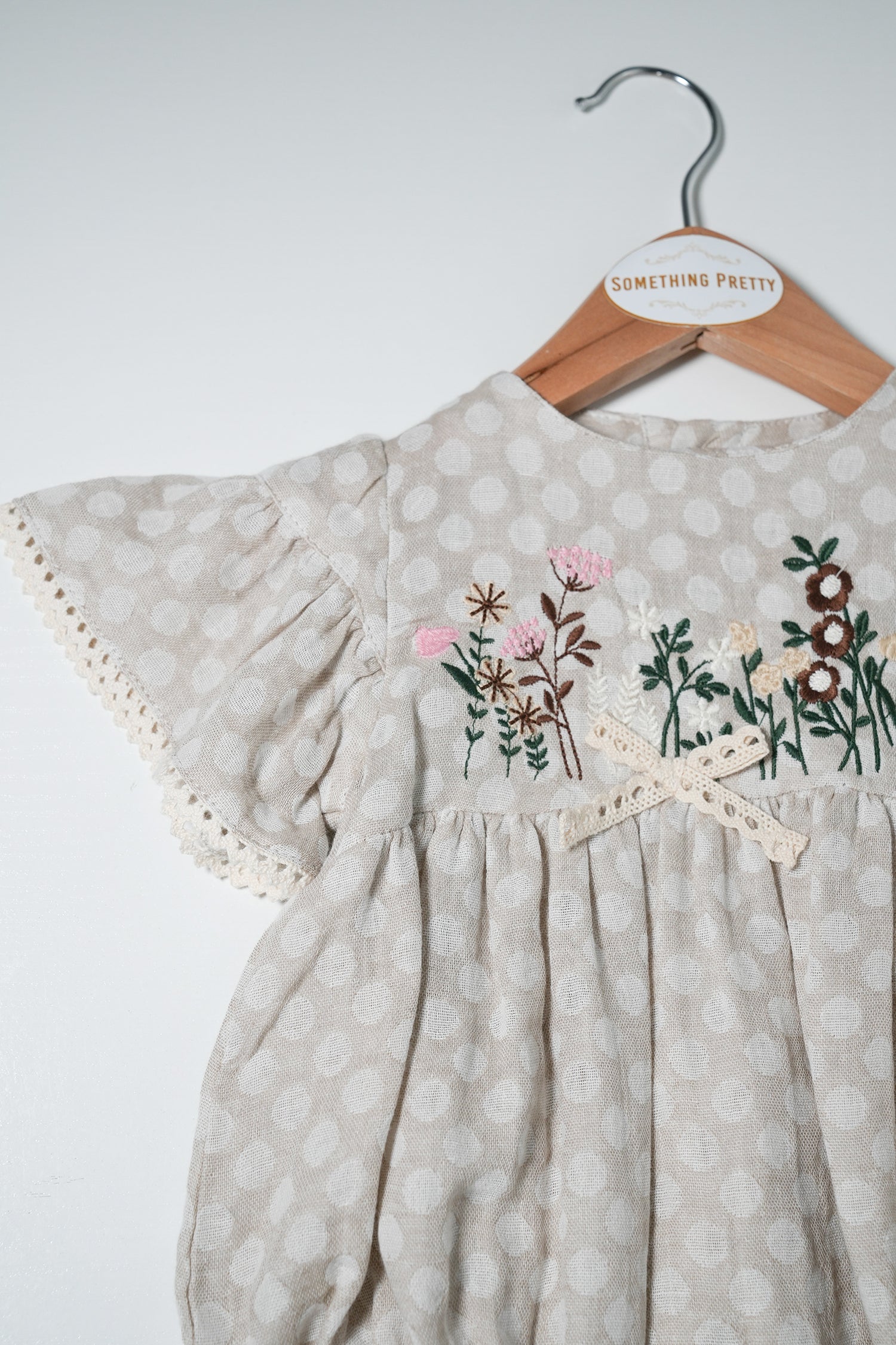 Beige Dotty Floral Romper