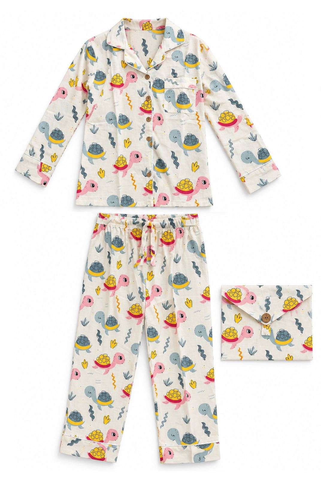 A children's pajama set laid out on a white background, including a long-sleeve button-front top, matching drawstring pants, and a small matching pouch. The pajamas have an off-white base with a colorful cartoon print of pink flamingos, blue turtles, yellow crabs, and green seaweed.