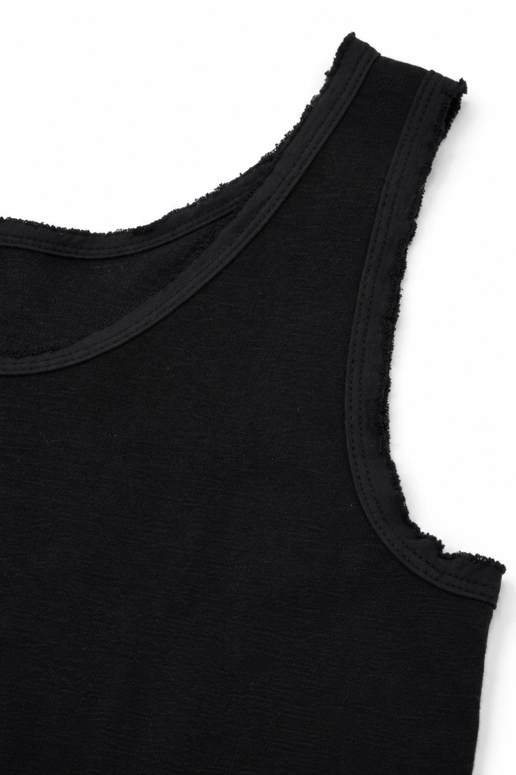 Close-up of a black sleeveless tank top with raw, frayed-edge trim on a plain white background.