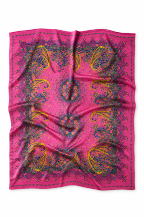A square pink scarf with a detailed multicolor paisley and floral pattern, laid flat on a white background.