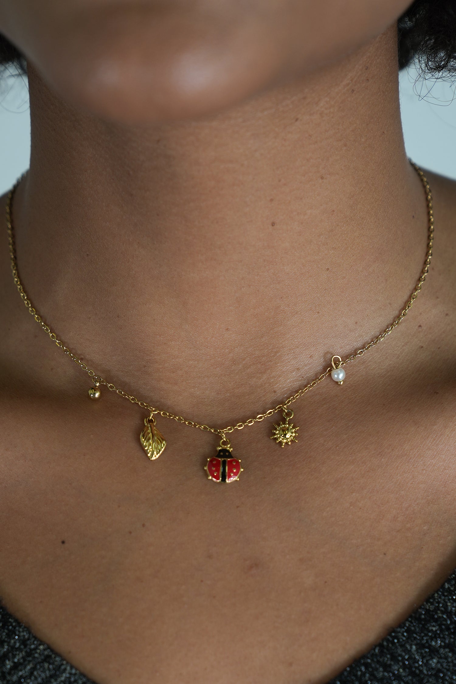 Ladybug and Pearl Necklace