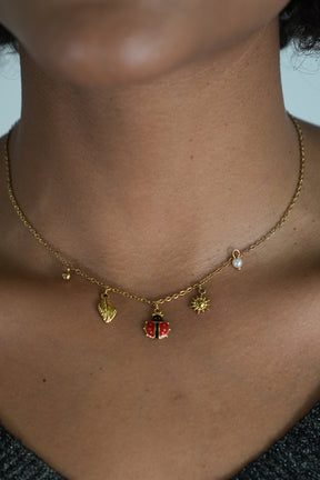 Ladybug and Pearl Necklace