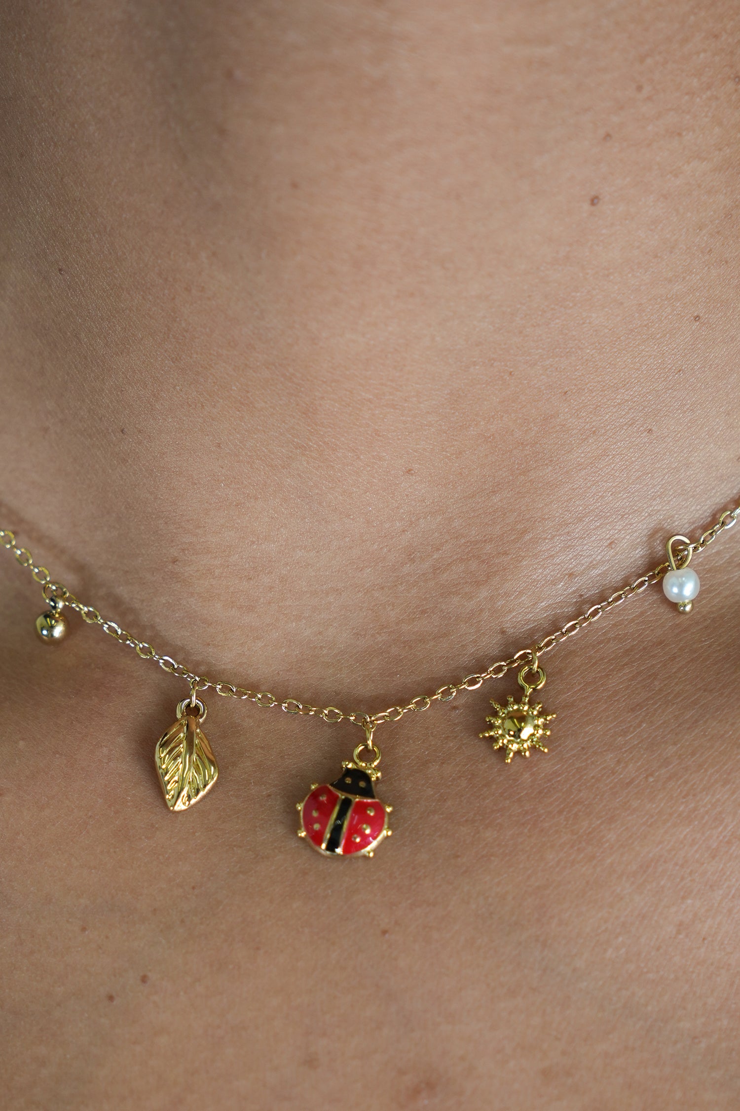 Ladybug and Pearl Necklace
