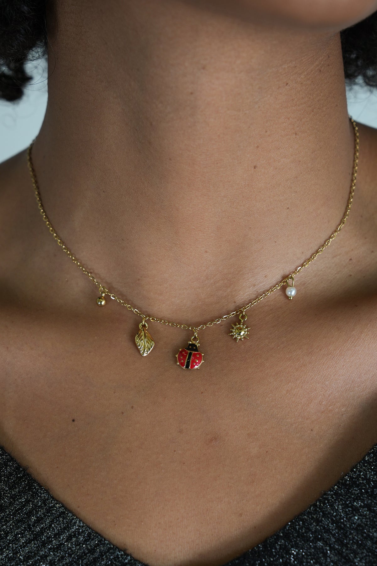 Ladybug and Pearl Necklace