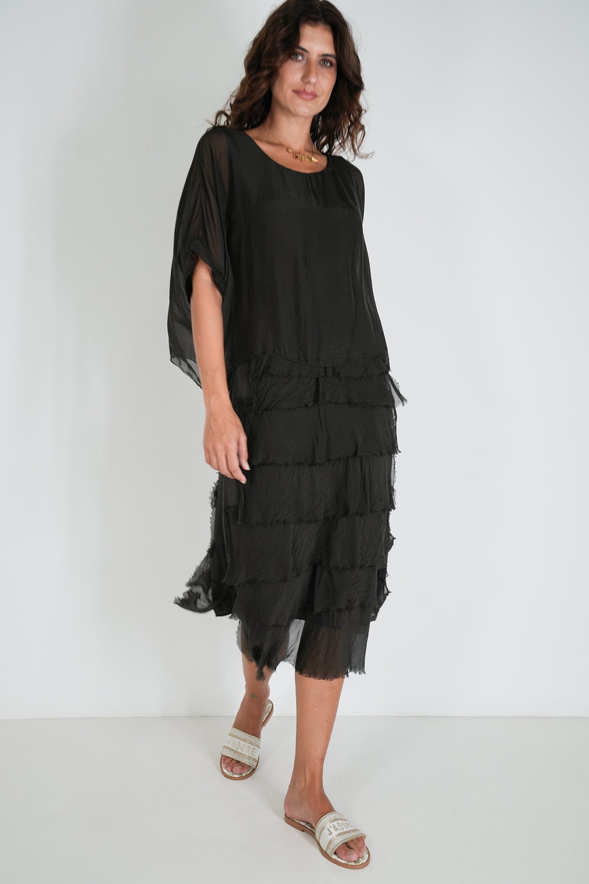 Women wearing flowing black dress