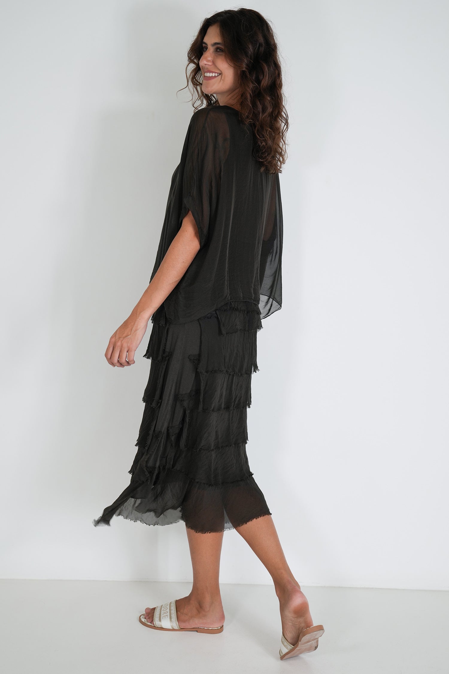 Chocolate Overlay Tier Silk Dress back view showing cascading tiered ruffles and midi length