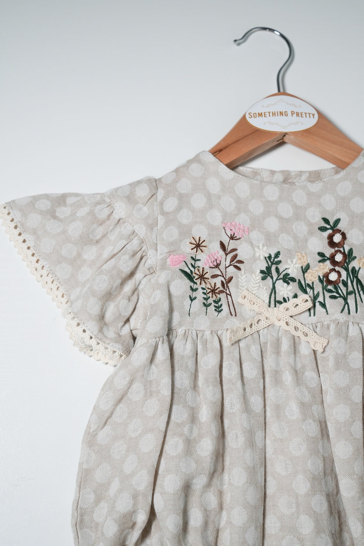 Beige Dotty Floral Romper