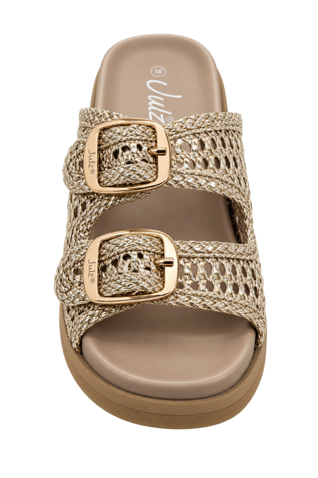 A single women's slide sandal by Cruz, featuring woven beige and gold straps with two large gold-tone buckle details, a tan footbed, and a brown platform sole, shown against a plain white background.