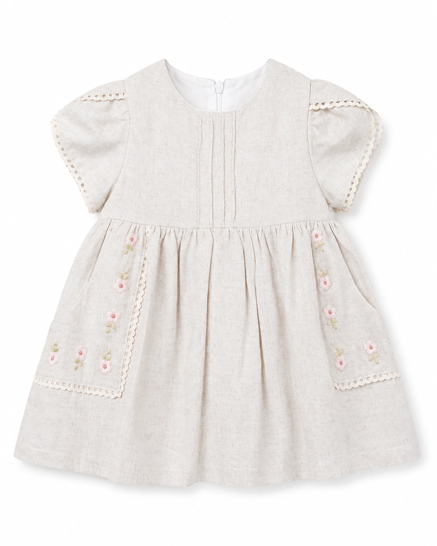 Baby dress with floral embroidery on a white background