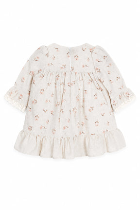 Floral dress with ruffled sleeves on a white background