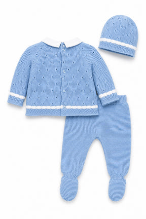 Blue knitted baby outfit with jacket, hat, and pants on a white background