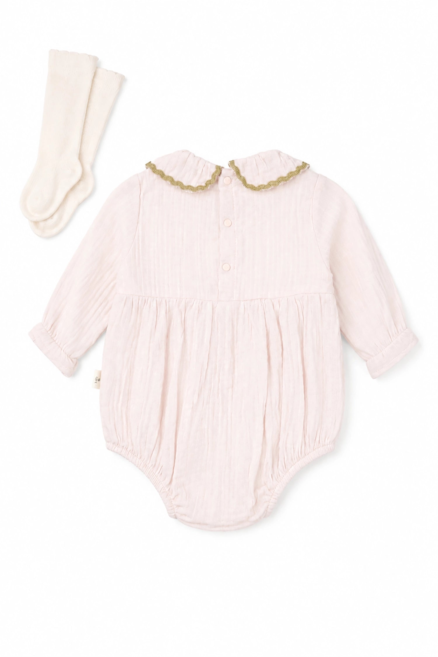 Pink baby romper with gold trim and matching socks on a white background