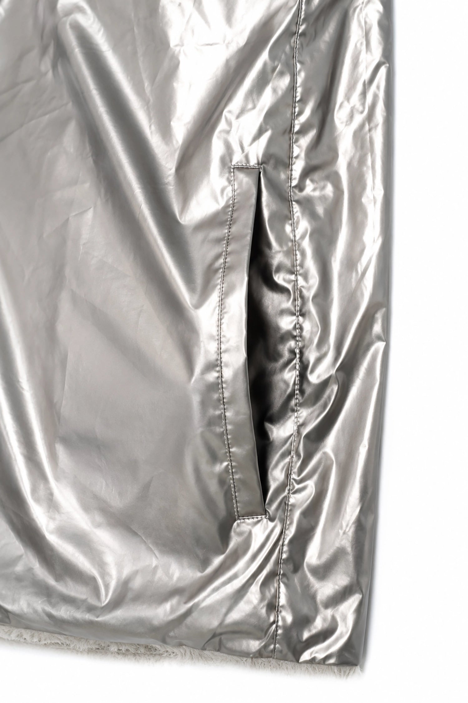 close up silver rain coat
