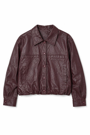 Burgundy pleather jacket on a white background