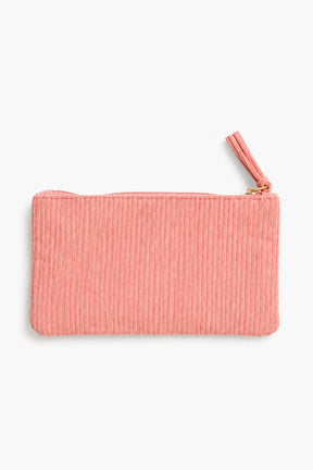 Pink ribbed pouch with a zipper on a white background