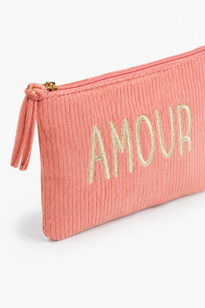 coral pouch with 'AMOUR' embroidery on a white background
