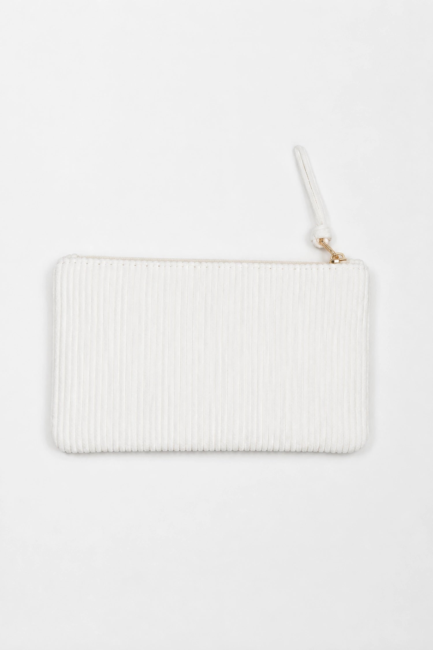 White ribbed clutch bag on a white background