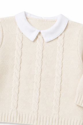 Cream-colored knitted vest with a white collar on a white background