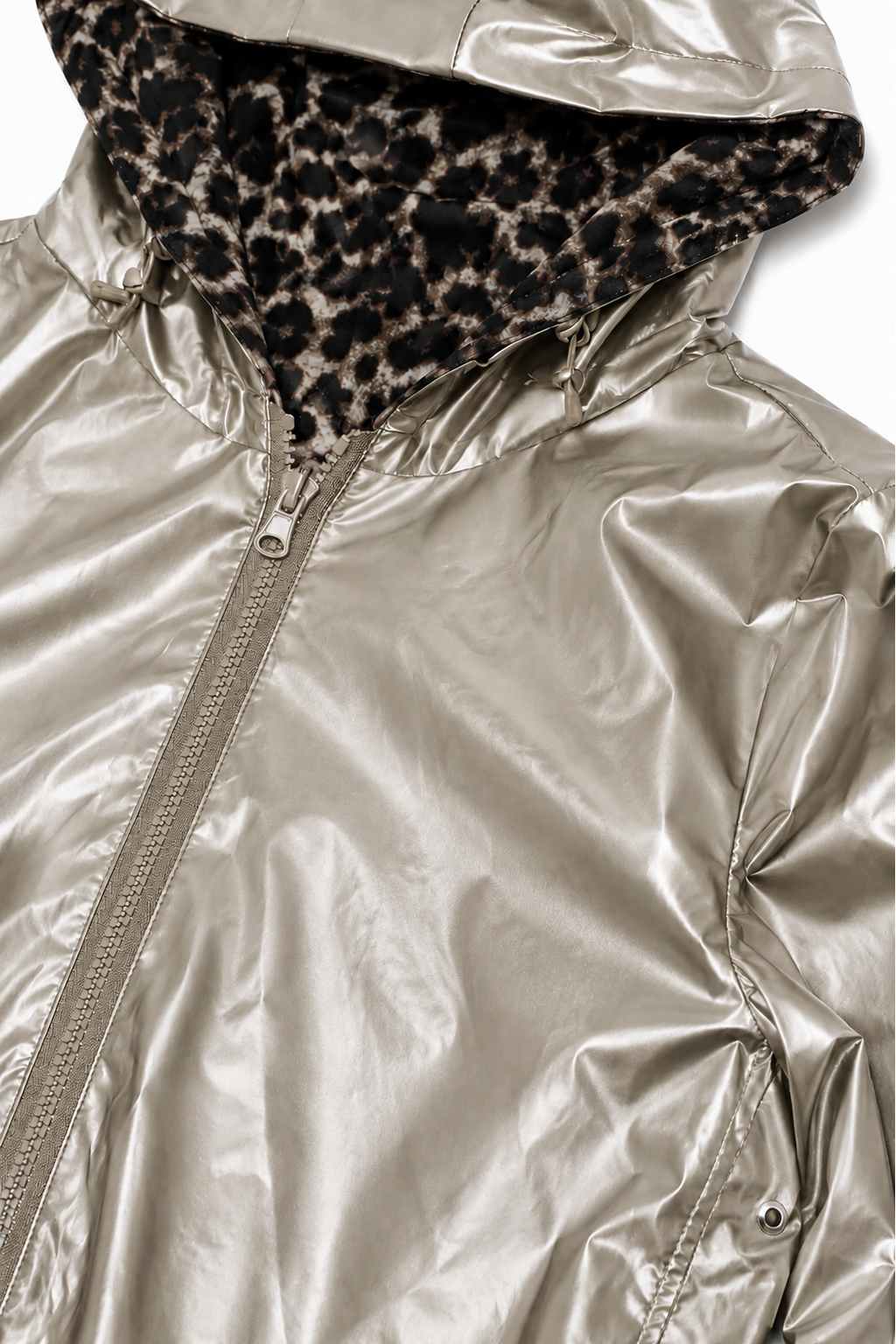 gold metallic jacket with leopard print lining on a white background
