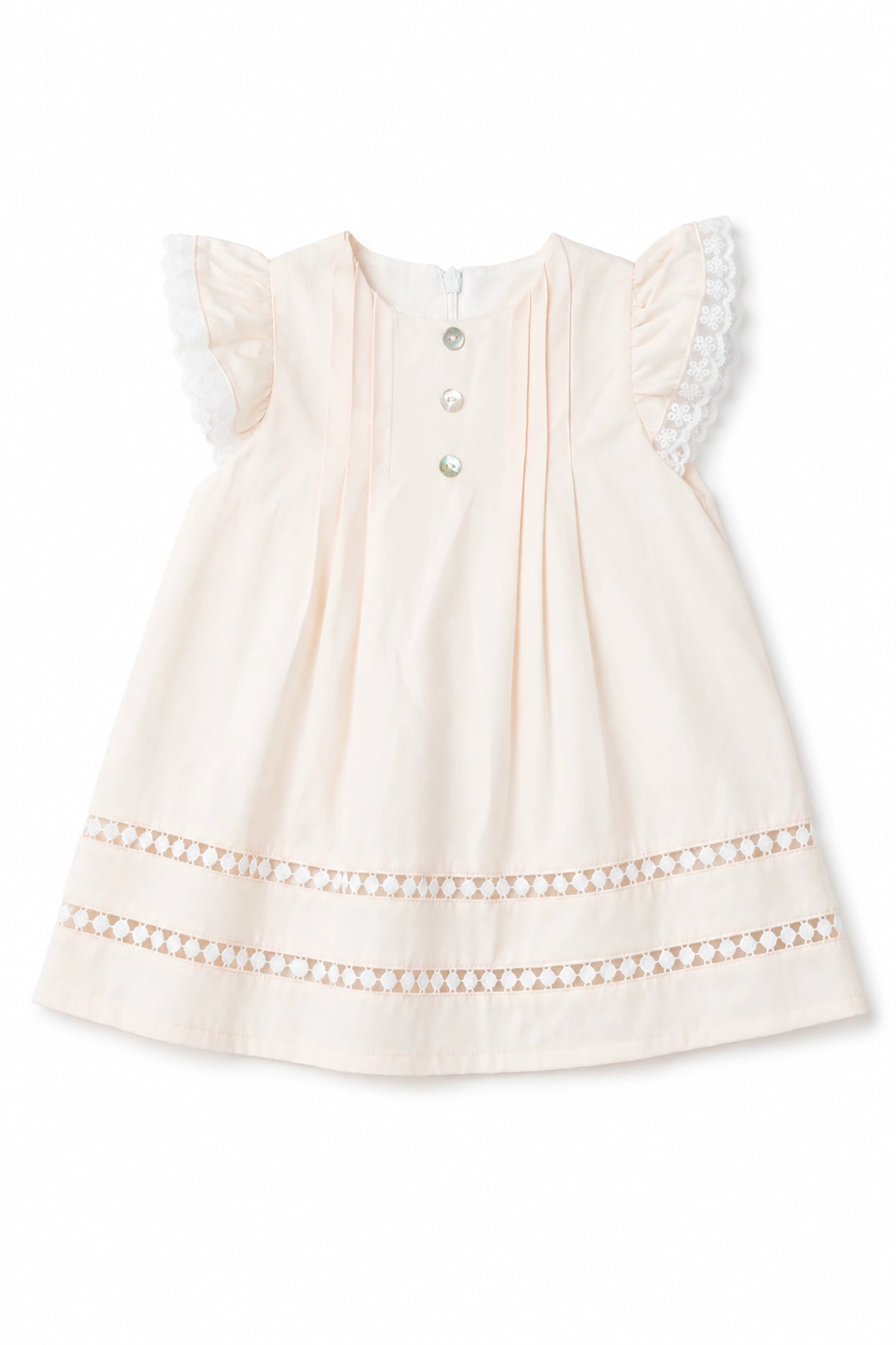 White baby dress with lace details on a white background