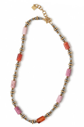 Necklace with pink and orange beads on a white background